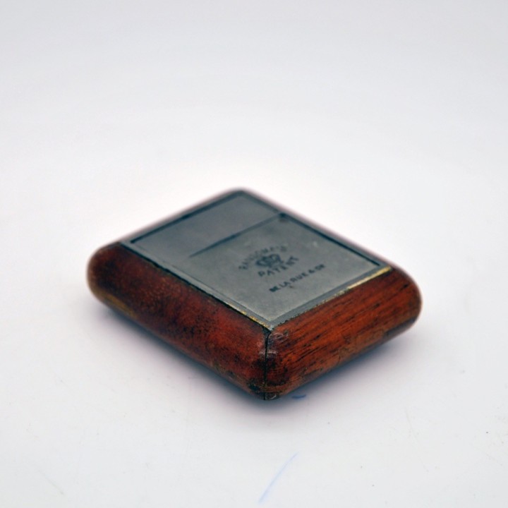 Tintero de barco de plomo y caoba