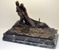 patinated bronze inkwell scene of fisherman in the net.