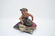 Inkwell polychrome regule - child lying on a rock