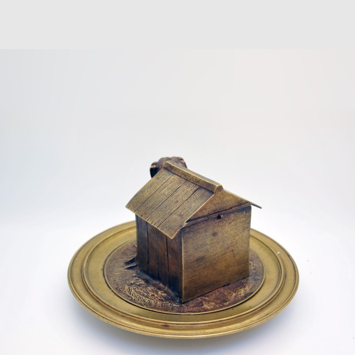 Tintero de bronce con un perro, obra de Moigniez
