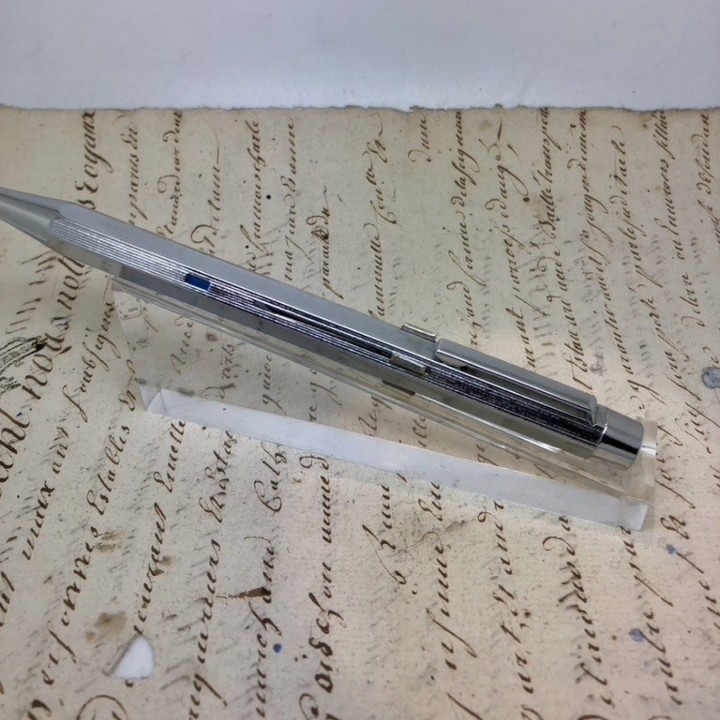 Stylo bille 4 couleurs plaqué argent 1970