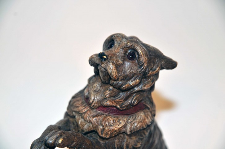 Polychrome bronze inkwell shaped trained dog
